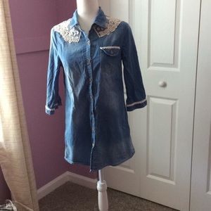 Jean tunic with lace detail along the top.